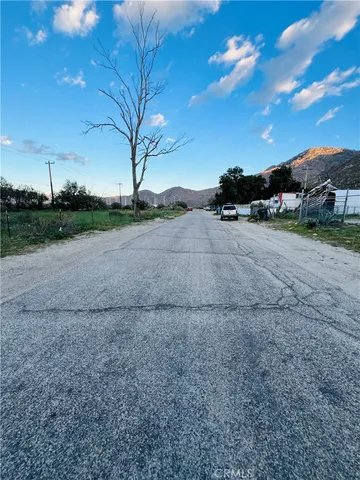 a view of a house with a street