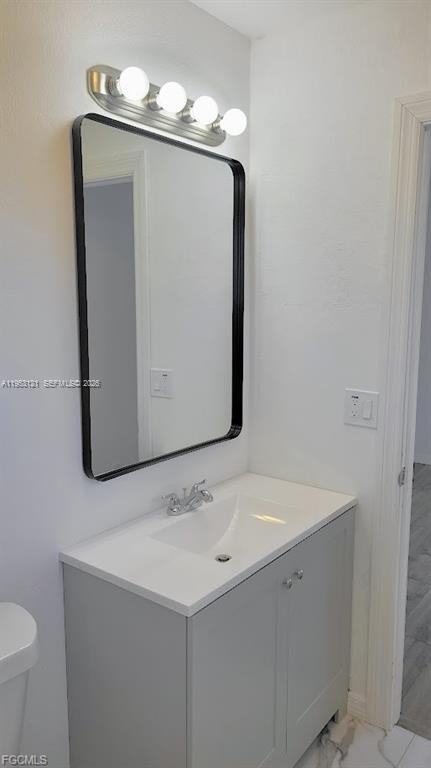 4008 Rye Court LaBelle, FL 33935 - Photo 7 of 12 a bathroom with a sink and a mirror