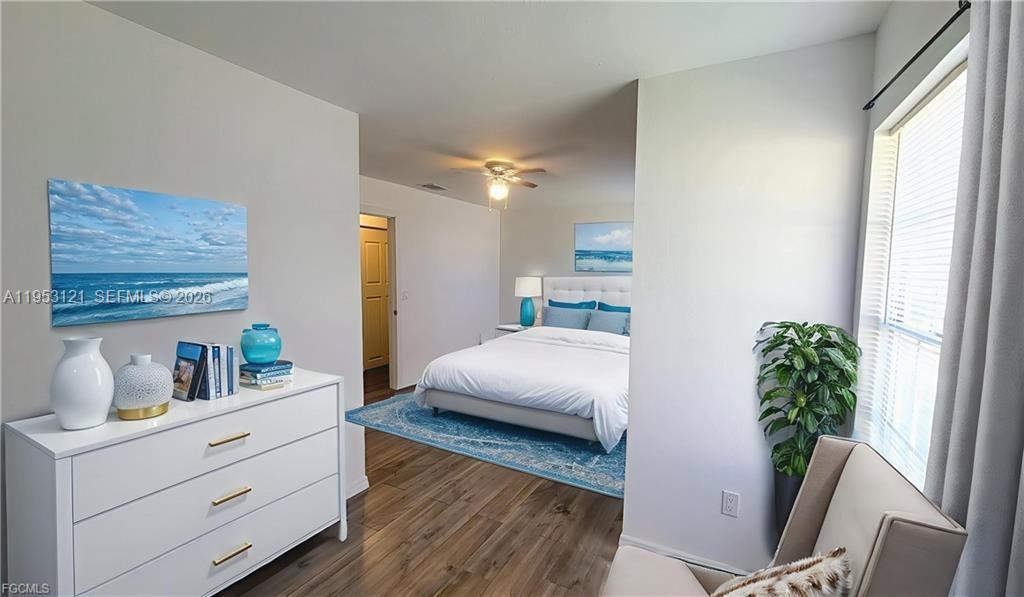 4008 Rye Court LaBelle, FL 33935 - Photo 10 of 12 a bedroom with furniture and a potted plant