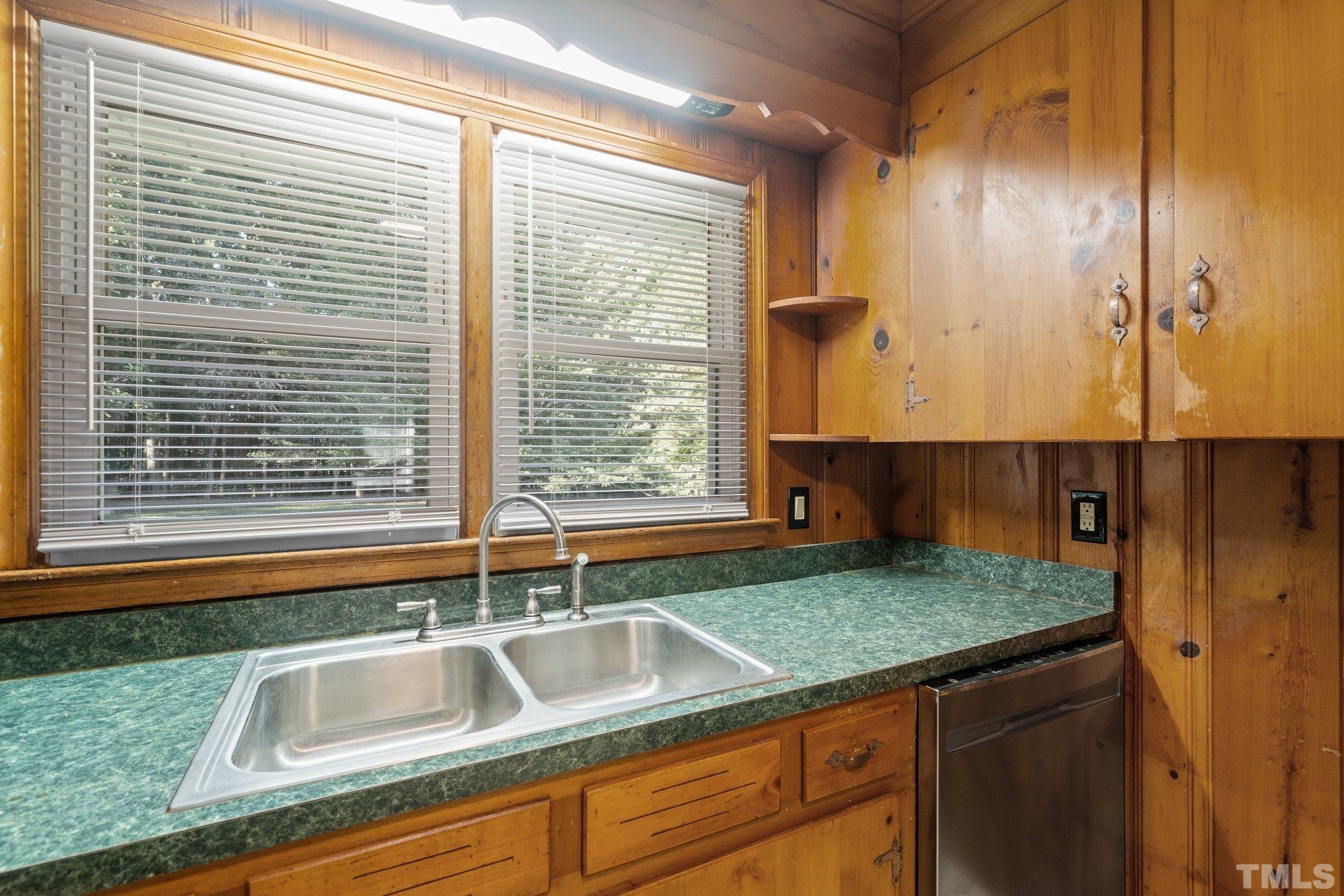 3645 Hicksboro Road Henderson, NC 27537 - Photo 15 of 37 a view of a sink and a window
