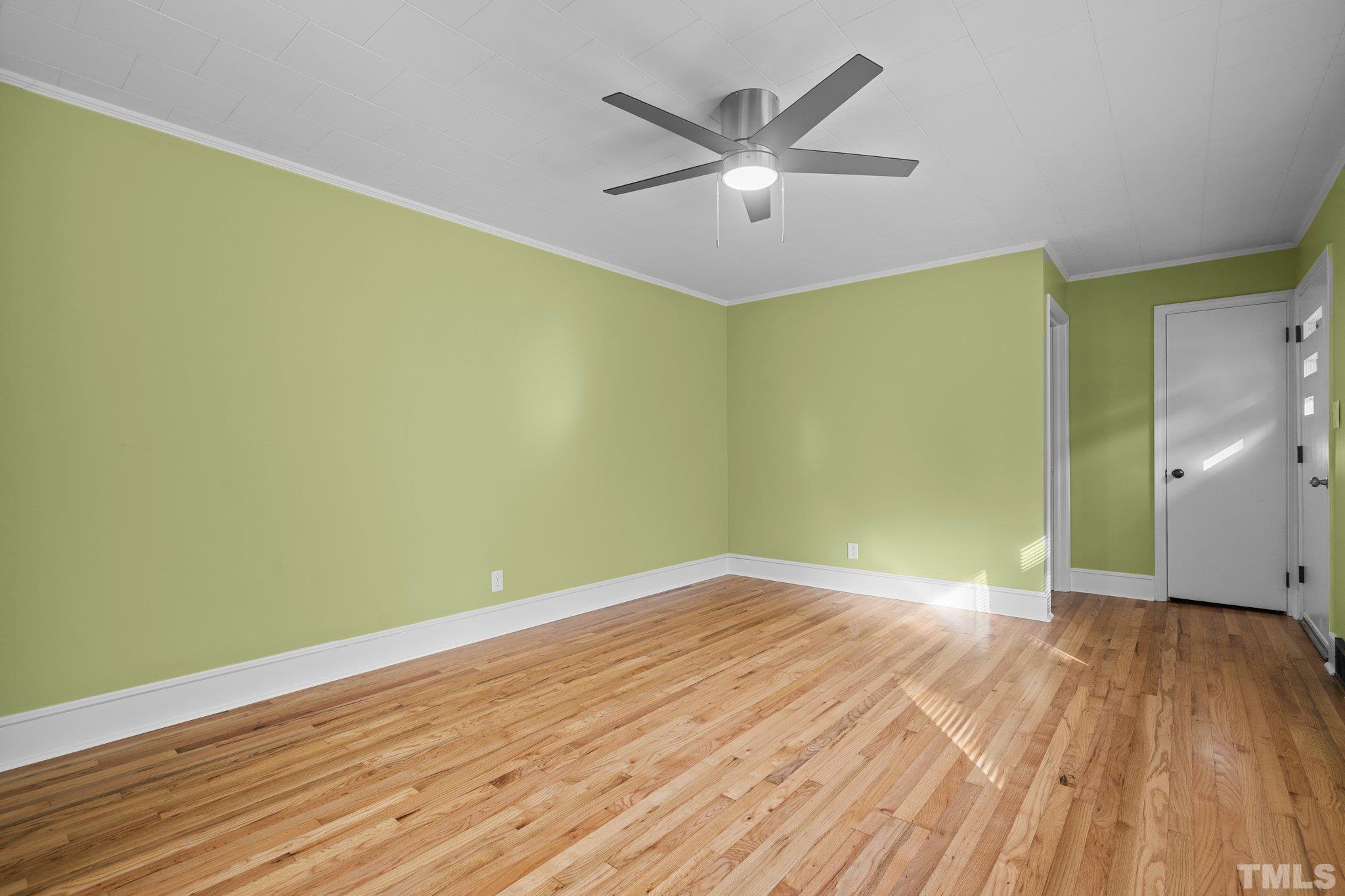 3645 Hicksboro Road Henderson, NC 27537 - Photo 17 of 37 a view of empty room with wooden floor