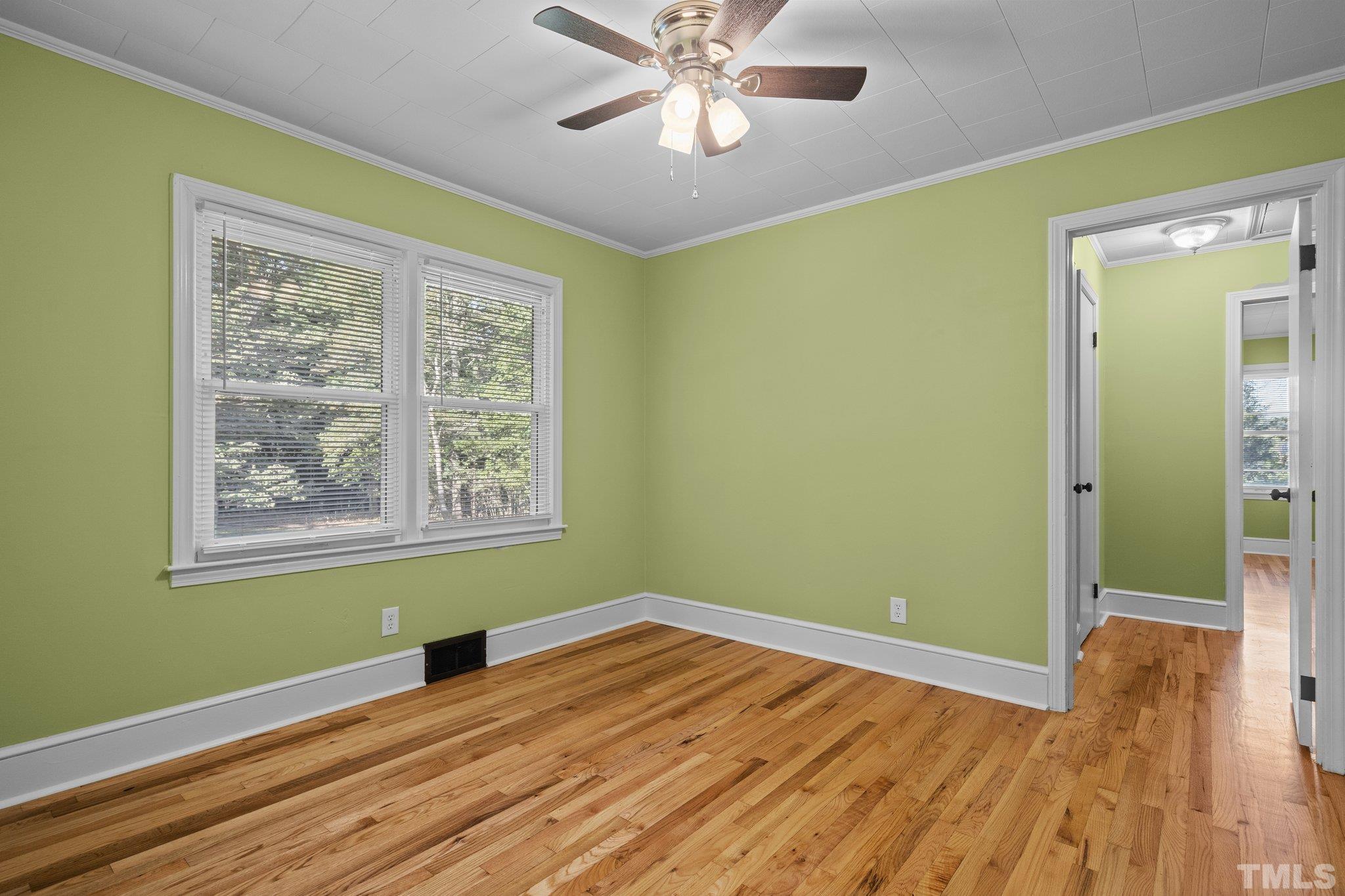 3645 Hicksboro Road Henderson, NC 27537 - Photo 28 of 37 a view of room with window and wooden floor