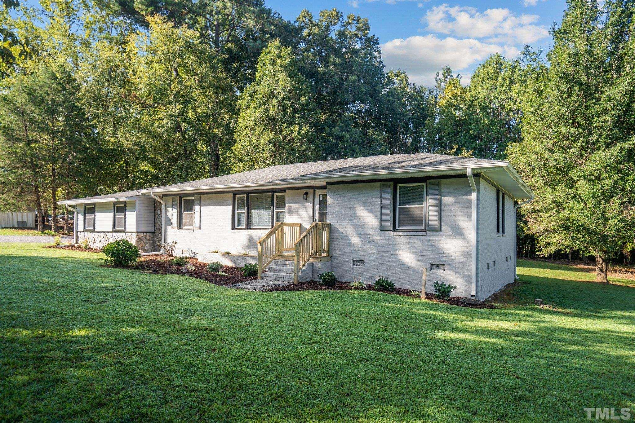 3645 Hicksboro Road Henderson, NC 27537 - Photo 29 of 37 front view of a house with a yard