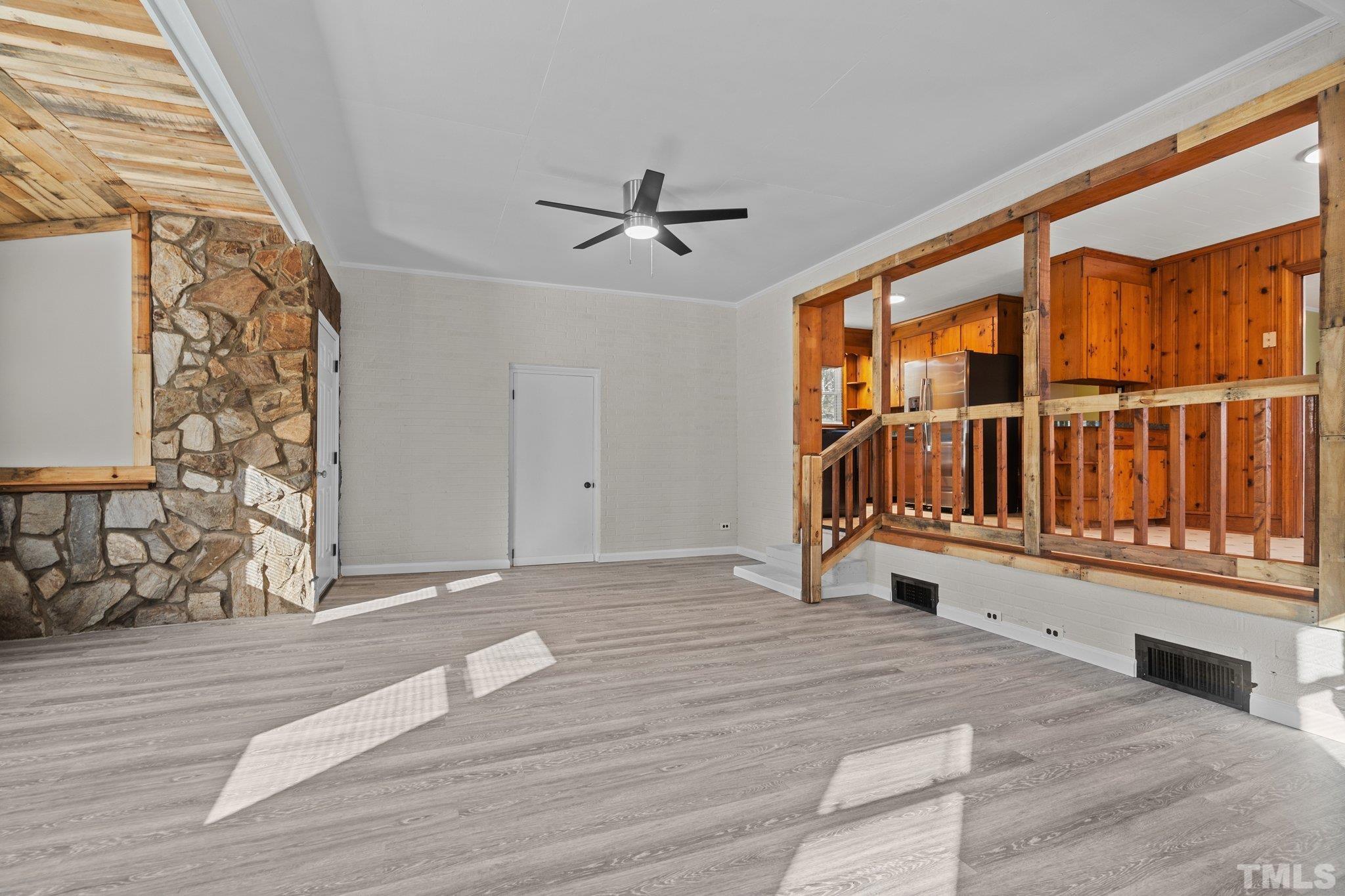 3645 Hicksboro Road Henderson, NC 27537 - Photo 5 of 37 a view of a livingroom with a staircase
