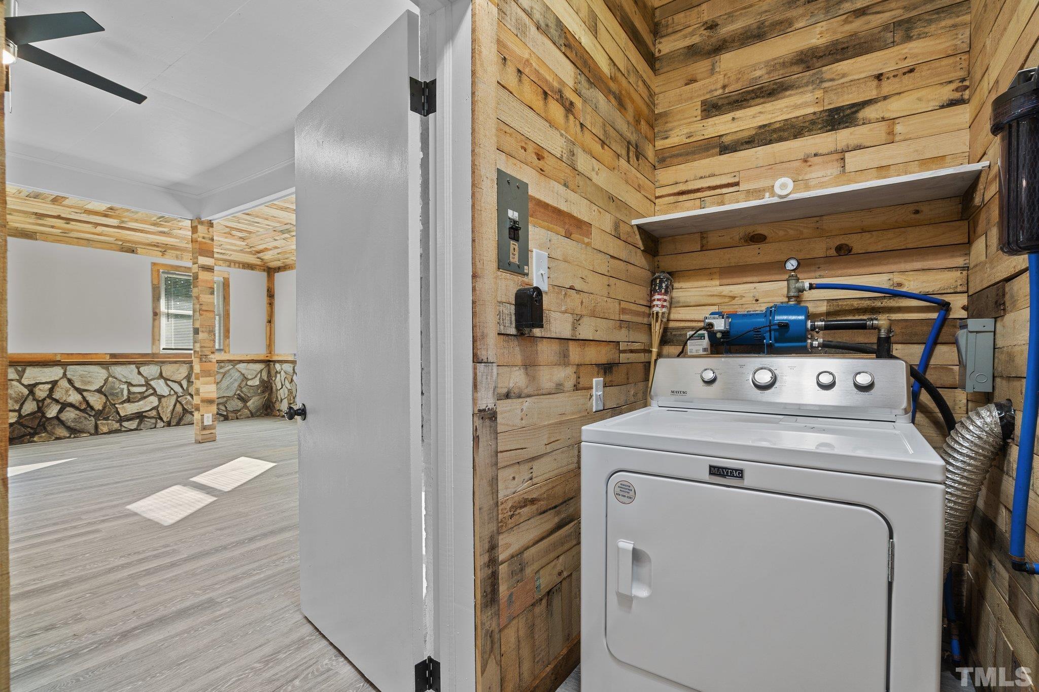 3645 Hicksboro Road Henderson, NC 27537 - Photo 9 of 37 a utility room with dryer and washer