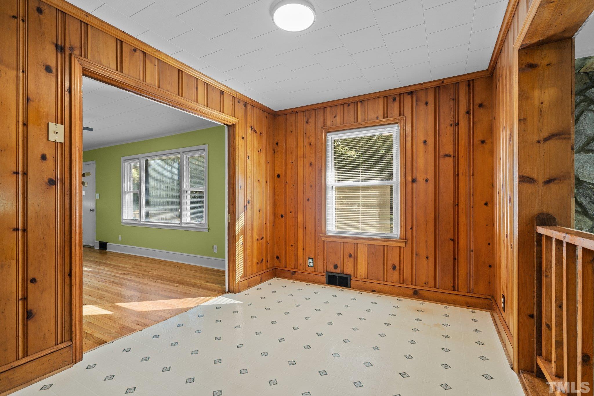 3645 Hicksboro Road Henderson, NC 27537 - Photo 10 of 37 a view of a hallway with windows and entryway