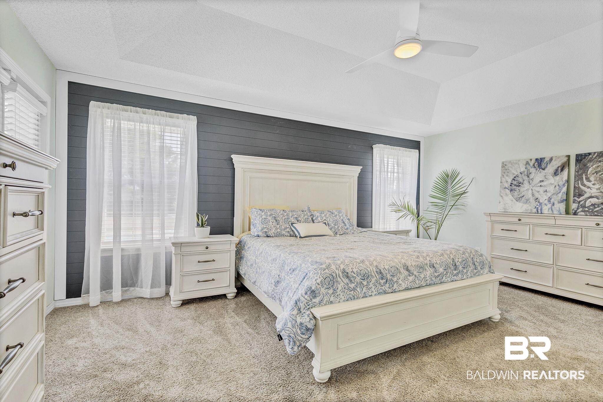 16358 Tempest Drive Foley, AL 36535 - Photo 23 of 46 Bedroom with a tray ceiling, ceiling fan, and light carpet