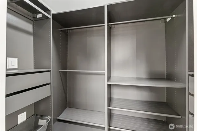 a view of an empty walk in closet