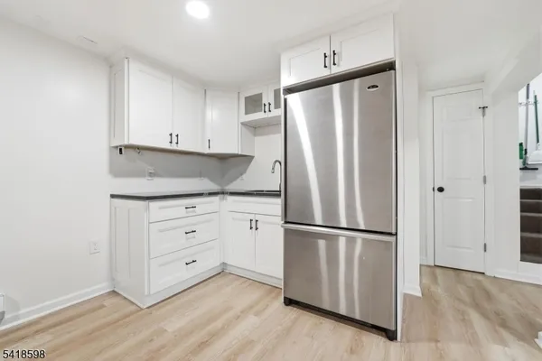 a view of backyard with patio