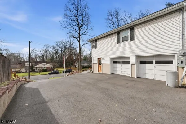 a view of backyard with sitting area
