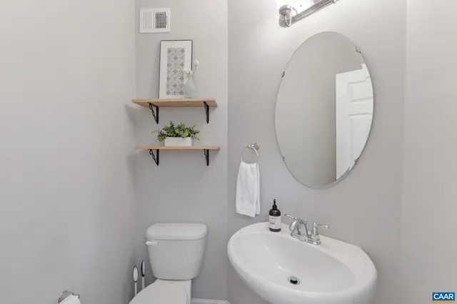 a view of balcony with wooden floor