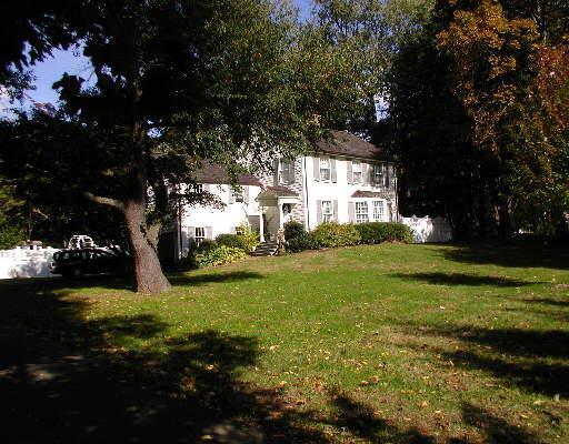 371 Greens Farms Road Westport, CT 06880 - Photo 1 of 1 a view of a trees in front of a house