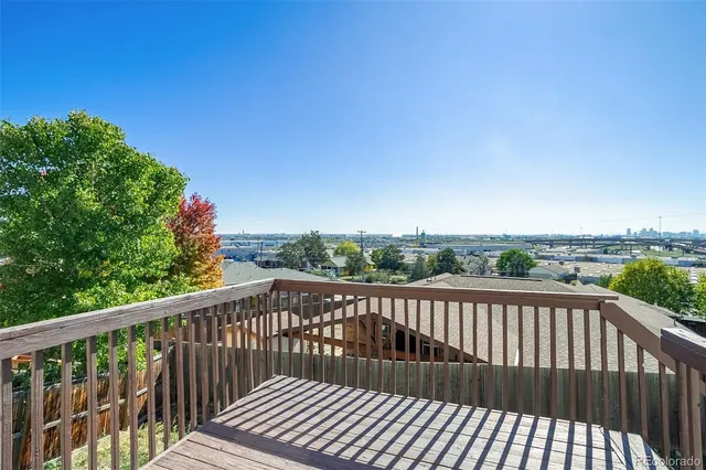 a view of a street view from a balcony