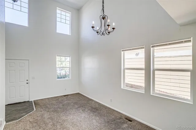 a view of empty room with windows
