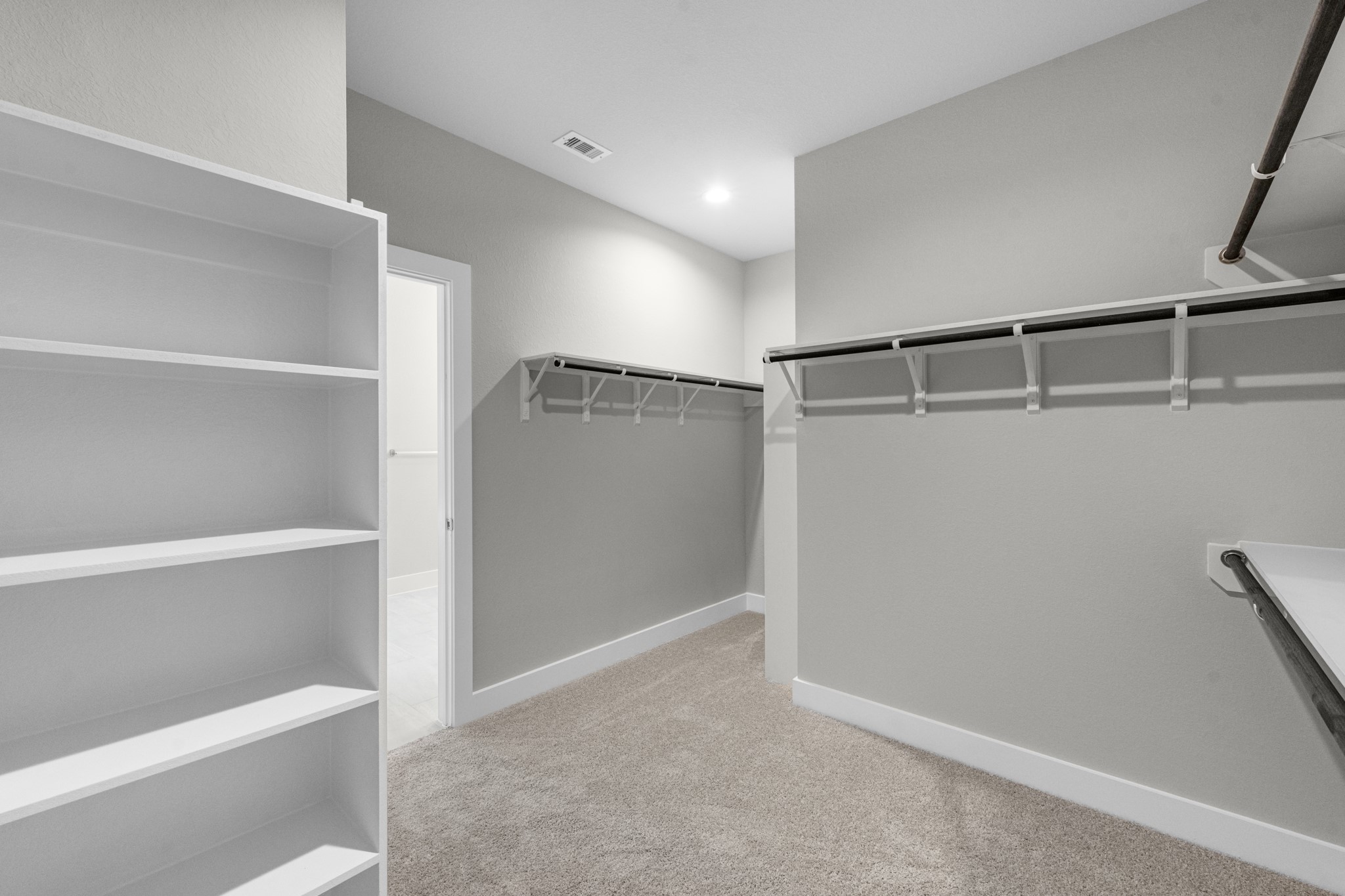 3410 Everglade Lane Rosenberg, TX 77471 - Photo 17 of 39 a view of an empty walk in closet