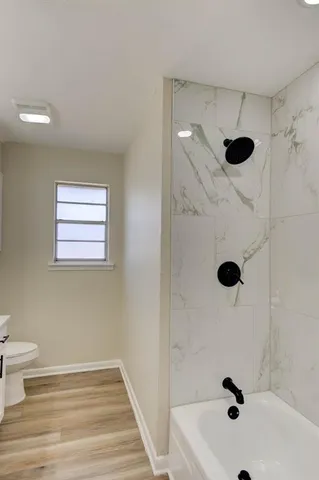 a bathroom with a sink and a shower