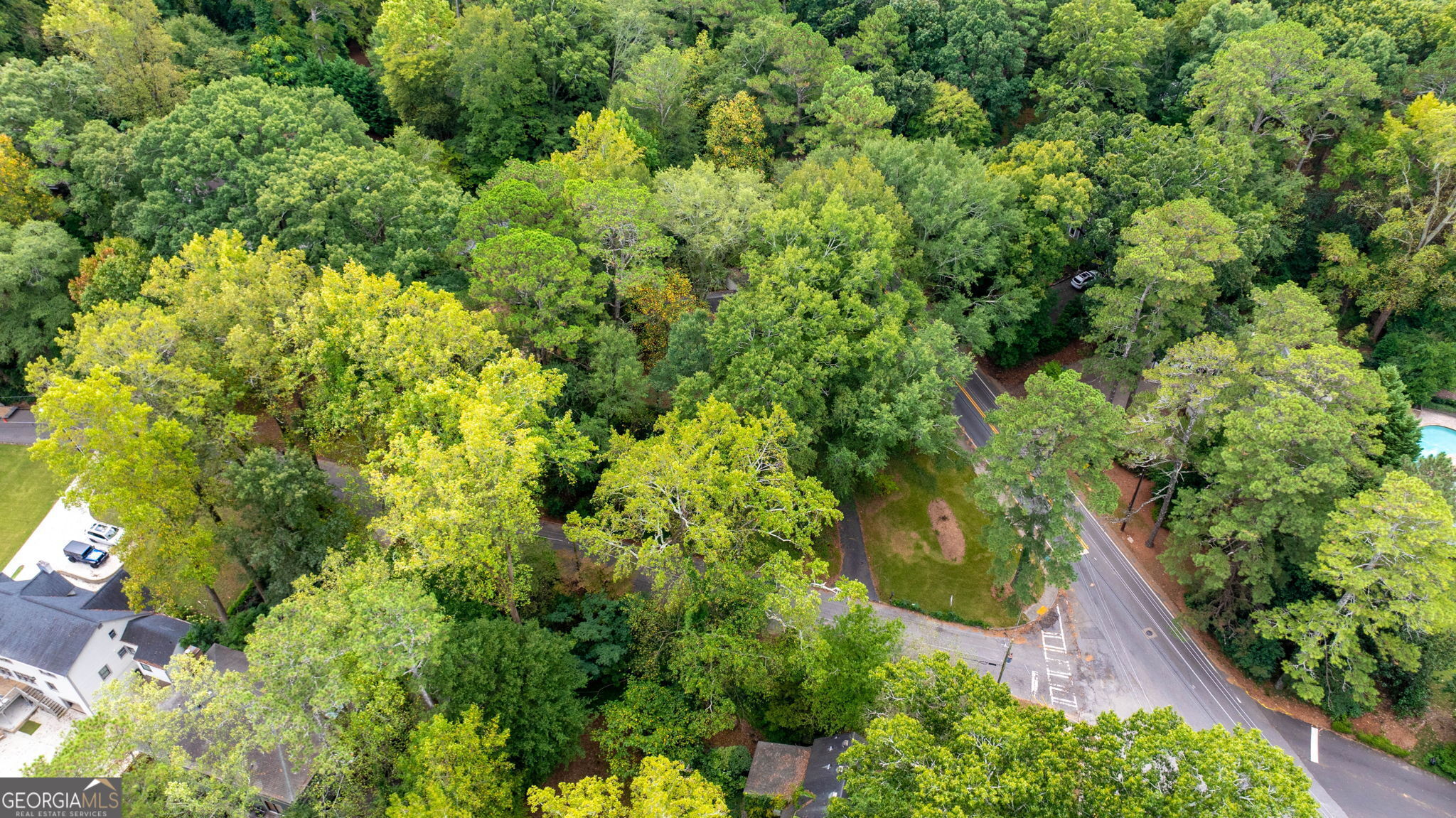 35 Putnam Circle Northeast Atlanta, GA 30342 - Photo 12 of 22 an aerial view of residential house with outdoor space and trees all around
