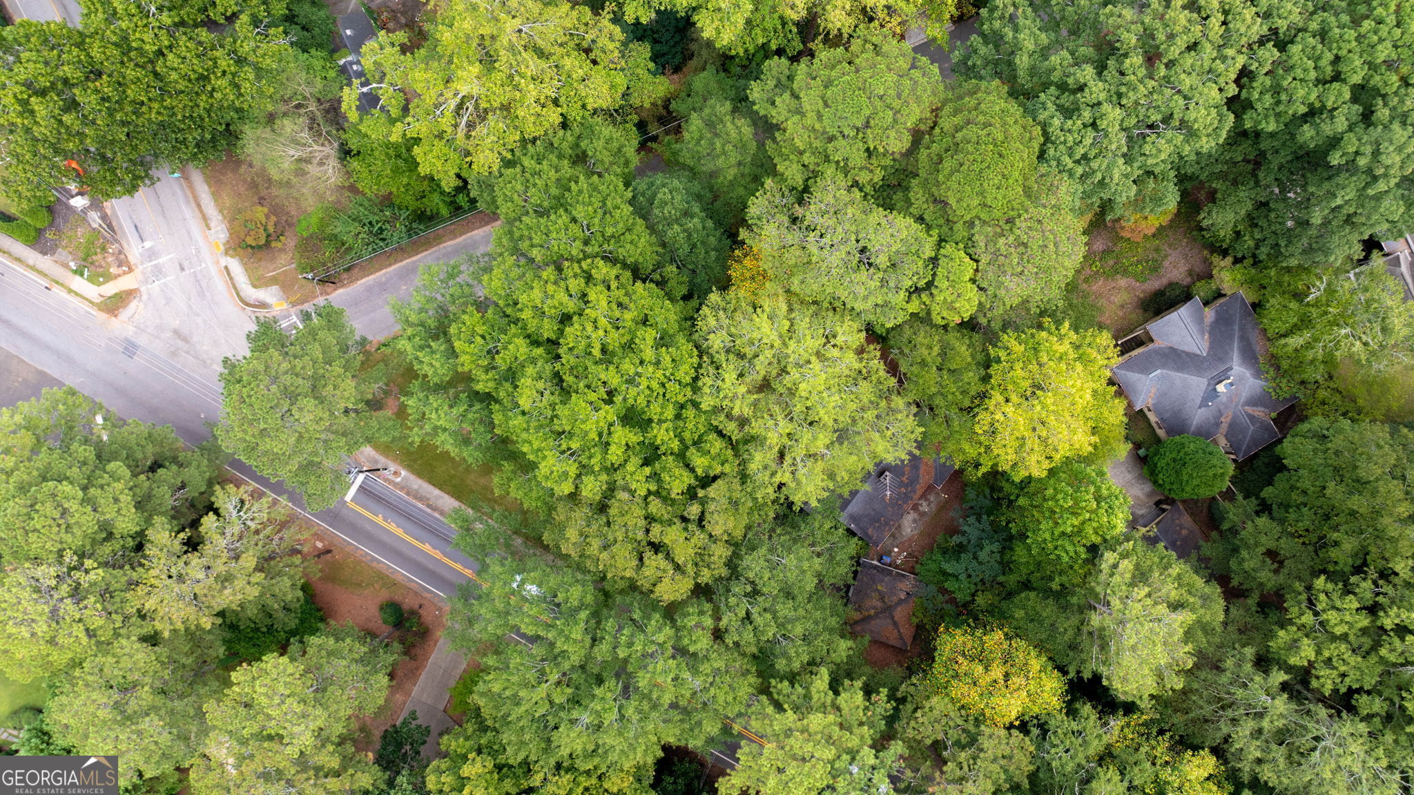 35 Putnam Circle Northeast Atlanta, GA 30342 - Photo 14 of 22 an aerial view of residential house with outdoor space and trees all around