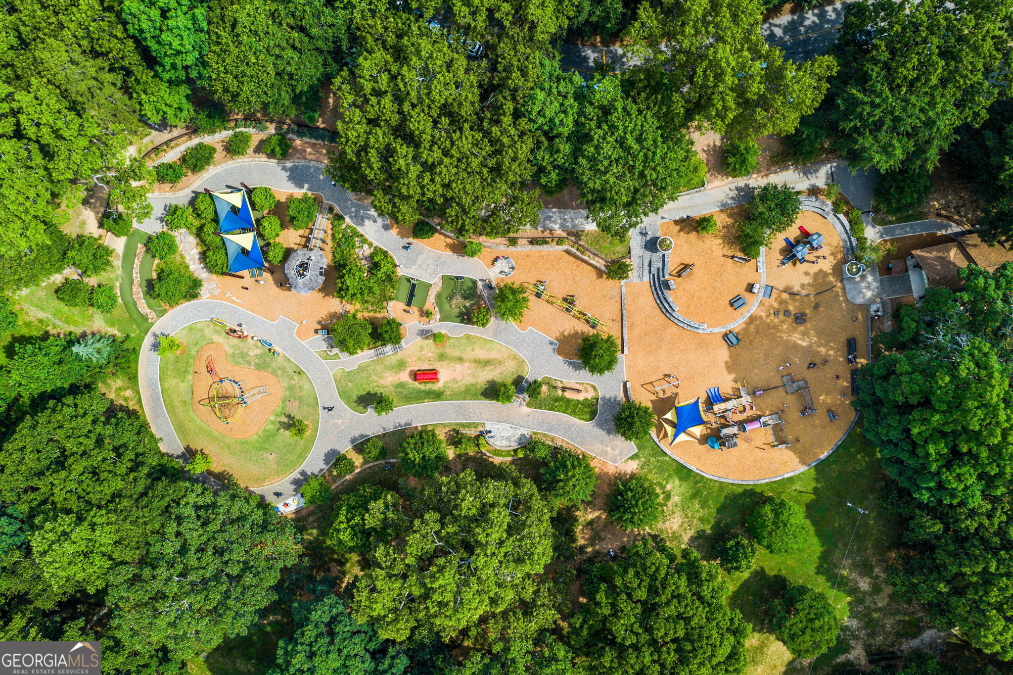 35 Putnam Circle Northeast Atlanta, GA 30342 - Photo 20 of 22 an aerial view of a house with a yard and garden