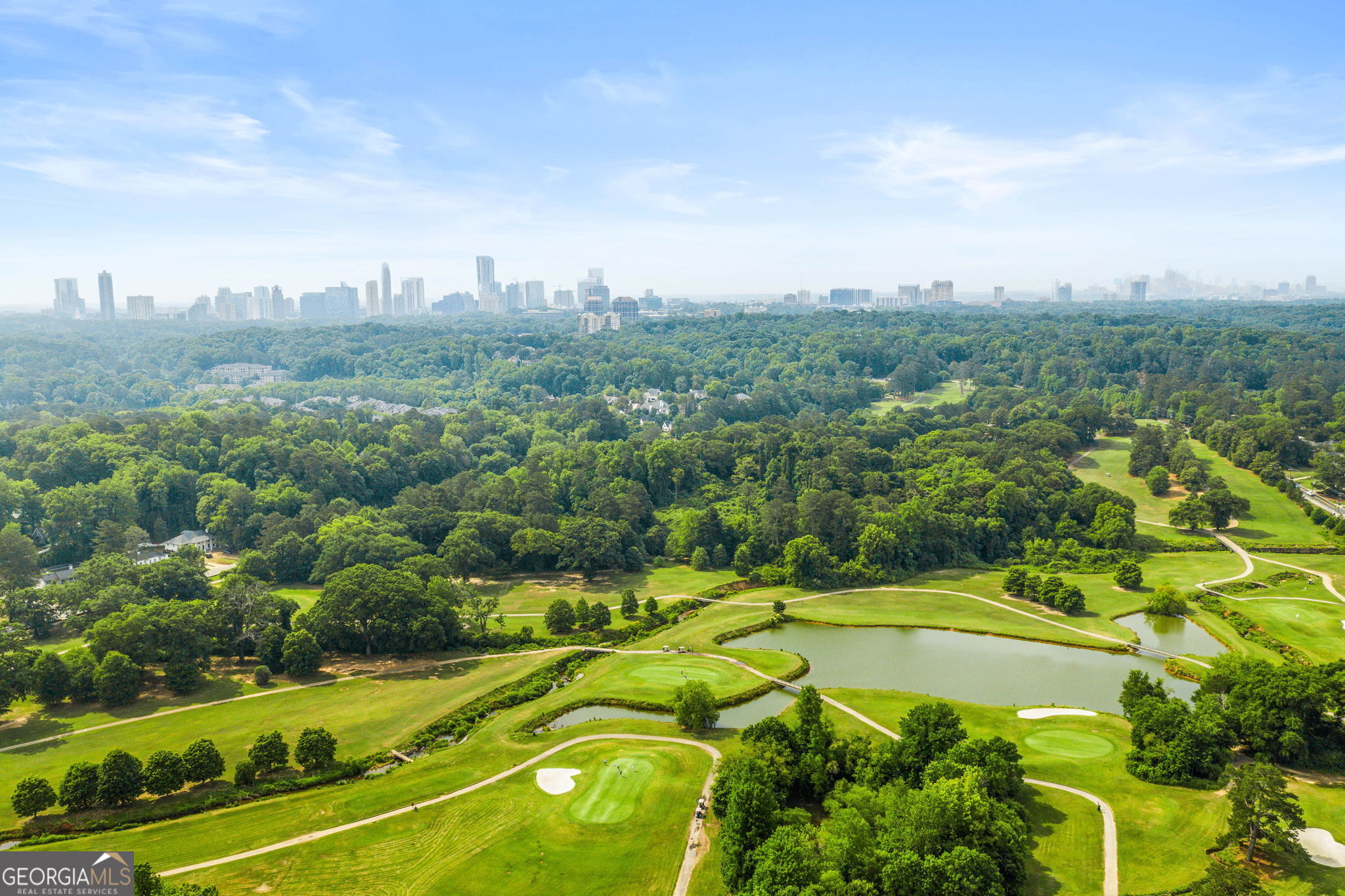 35 Putnam Circle Northeast Atlanta, GA 30342 - Photo 5 of 22 a view of a swimming pool with a yard