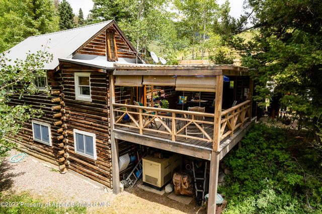 a front view of a house with a balcony