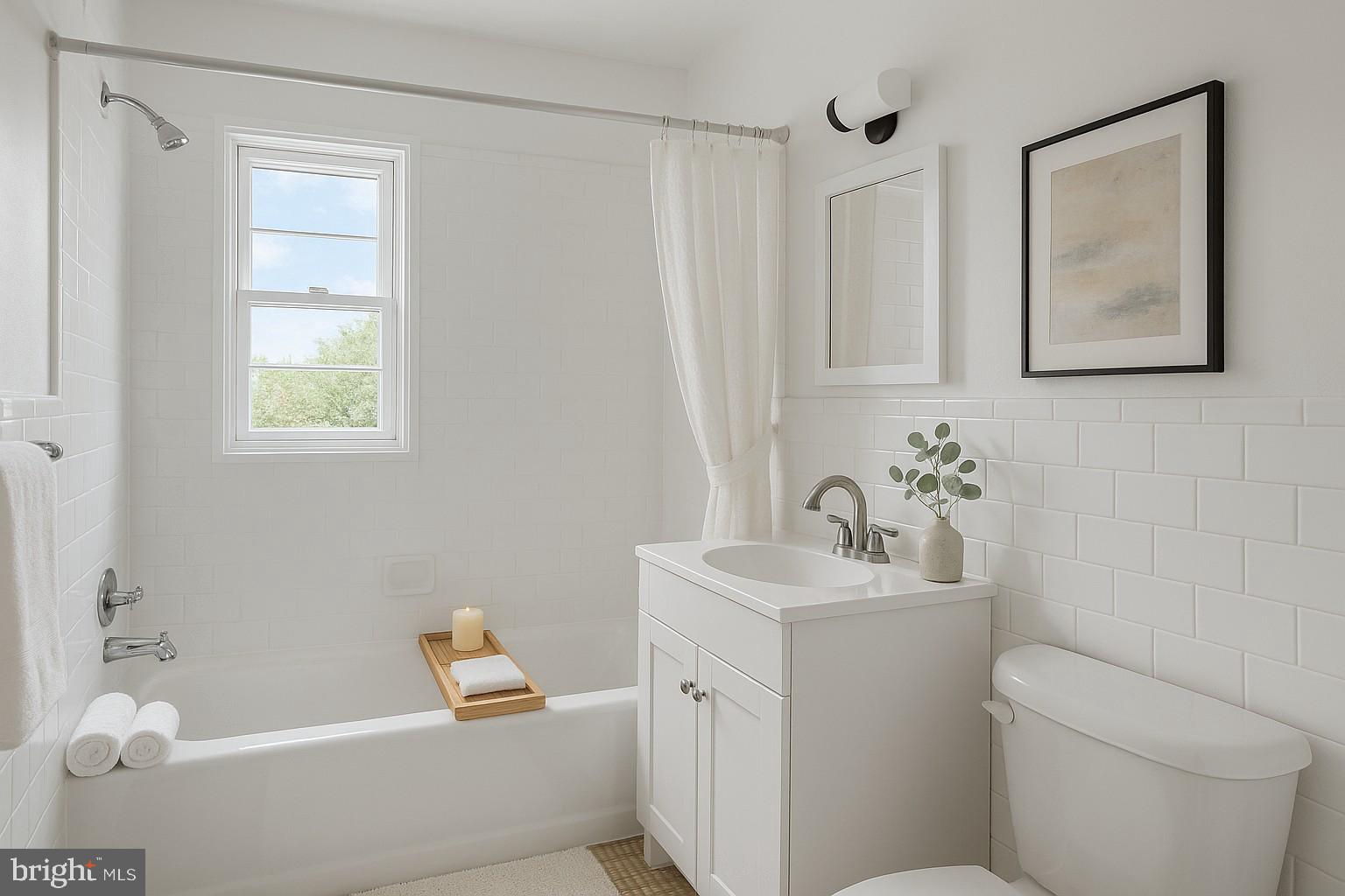 2103 Fort Davis Street Southeast, Unit A Washington, DC 20020 - Photo 11 of 22 a bathroom with a sink toilet and shower