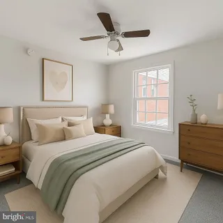 an empty room with ceiling fan and windows