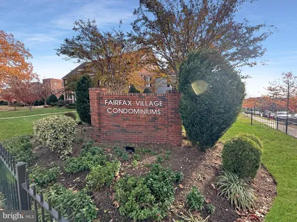 a view of cars parked in front of a building