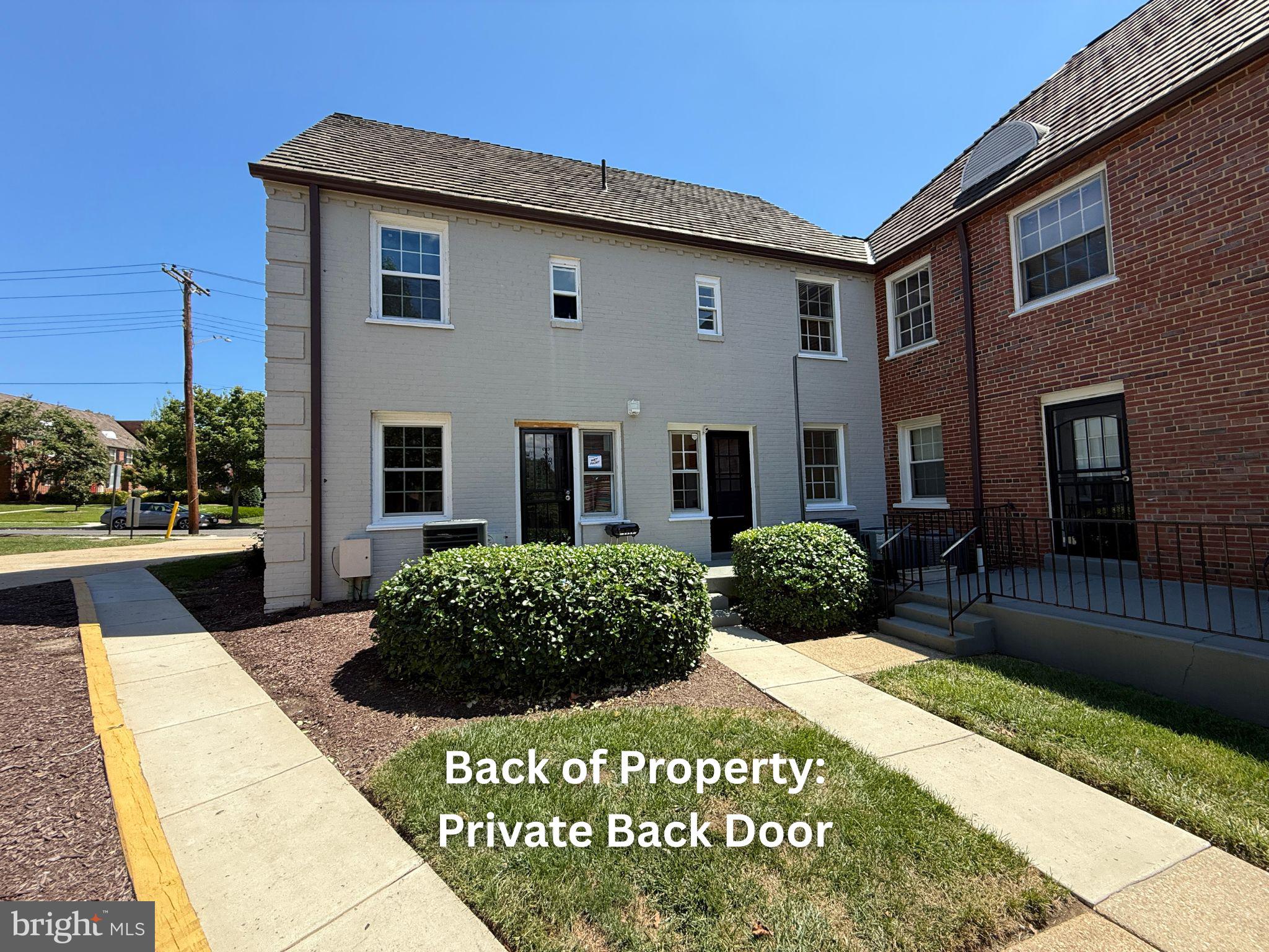 2103 Fort Davis Street Southeast, Unit A Washington, DC 20020 - Photo 2 of 22 a view of a house with a yard