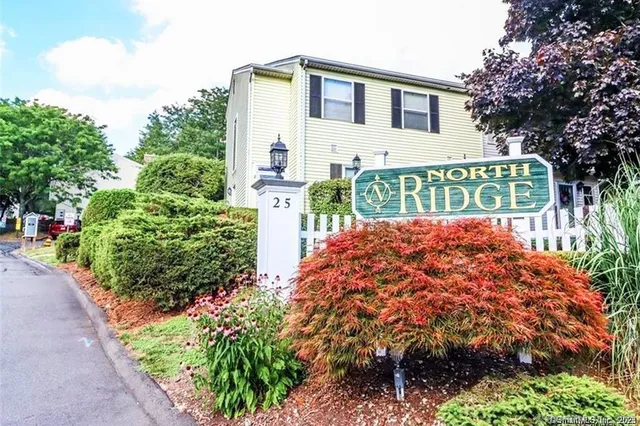 a sign on the side of a road