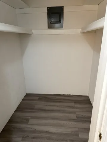 a view of an empty walk in closet