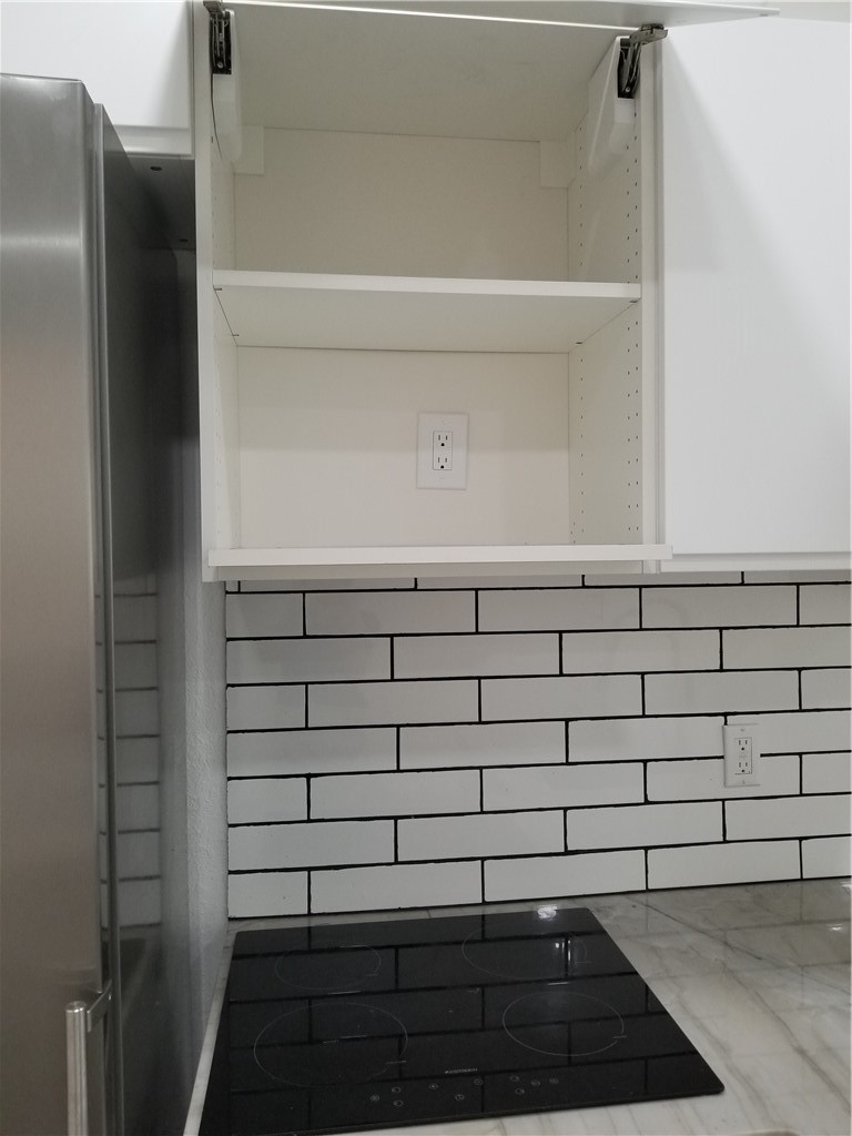 2605 Enfield Road, Unit 109 Austin, TX 78703 - Photo 16 of 33 Built-in Radiant Electric Stove Top