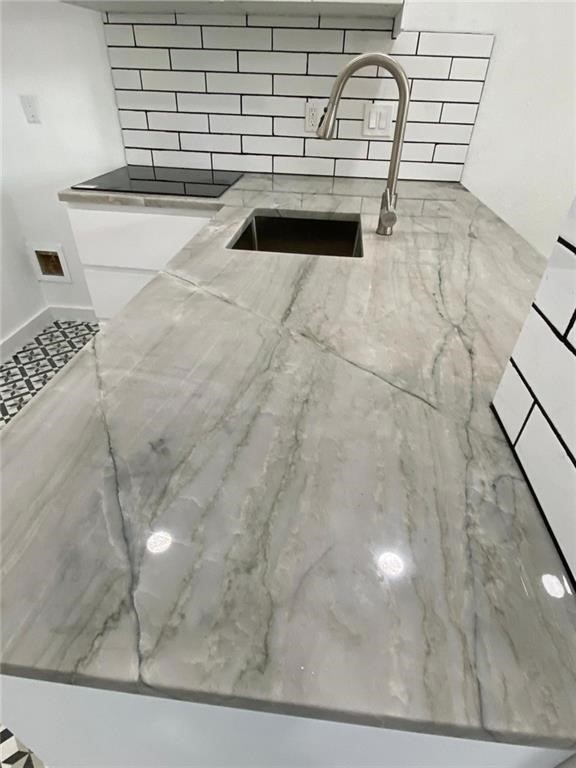2605 Enfield Road, Unit 109 Austin, TX 78703 - Photo 6 of 33 Natural Stone Counter