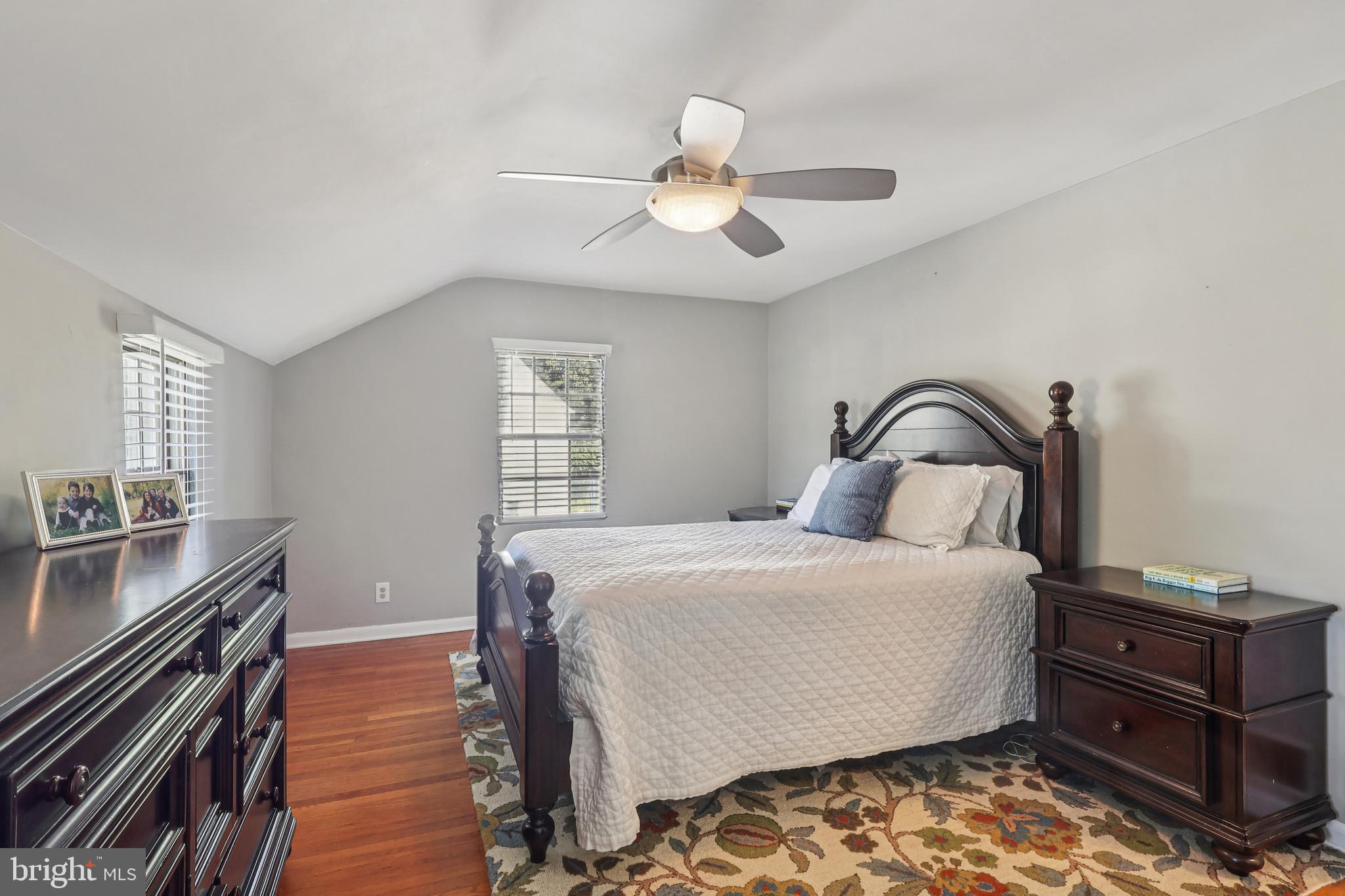131 Fairfax Road Bryn Mawr, PA 19010 - Photo 13 of 29 a bedroom with a bed and wooden floor
