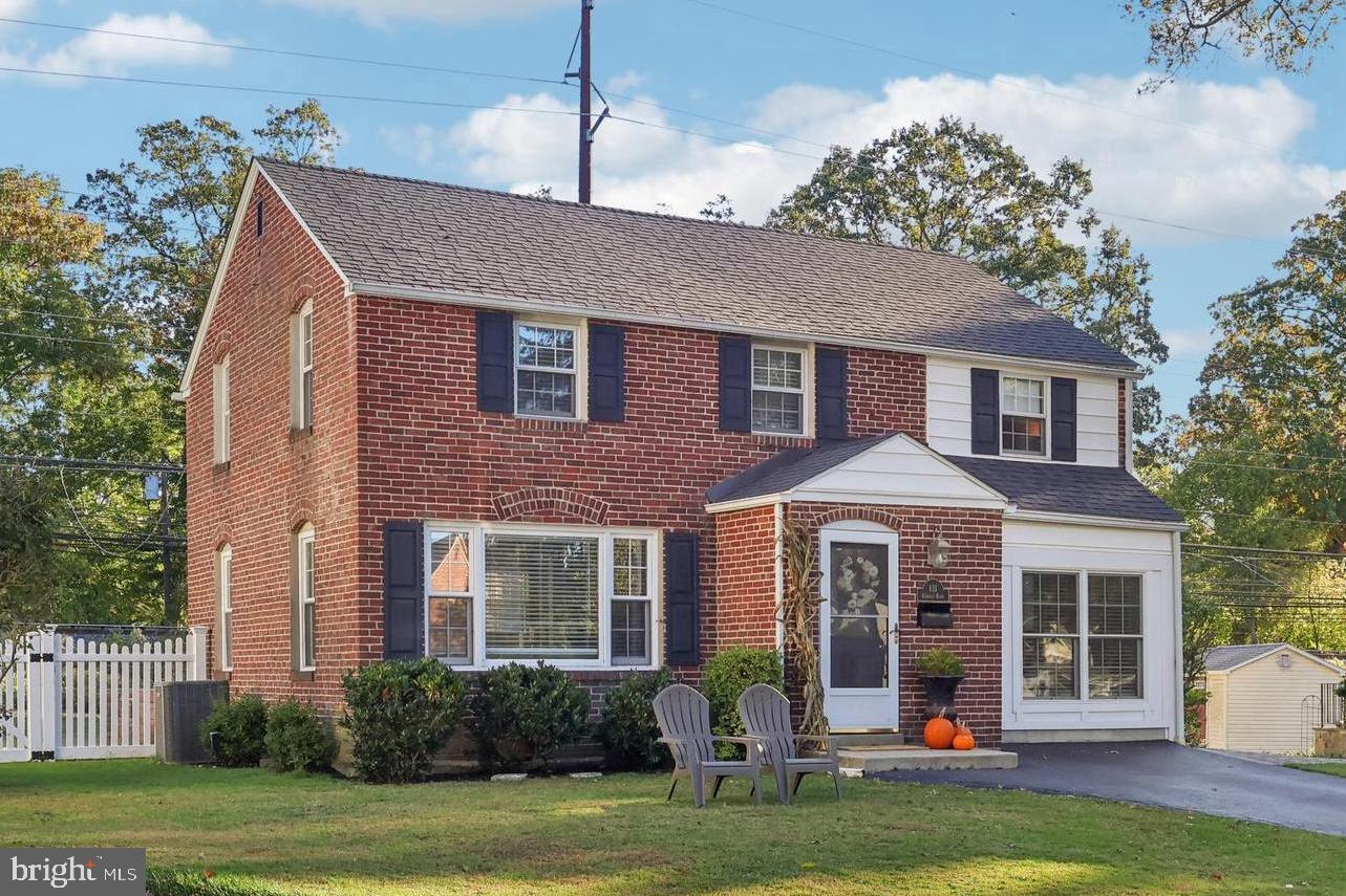 131 Fairfax Road Bryn Mawr, PA 19010 - Photo 2 of 29 a front view of a house with a yard