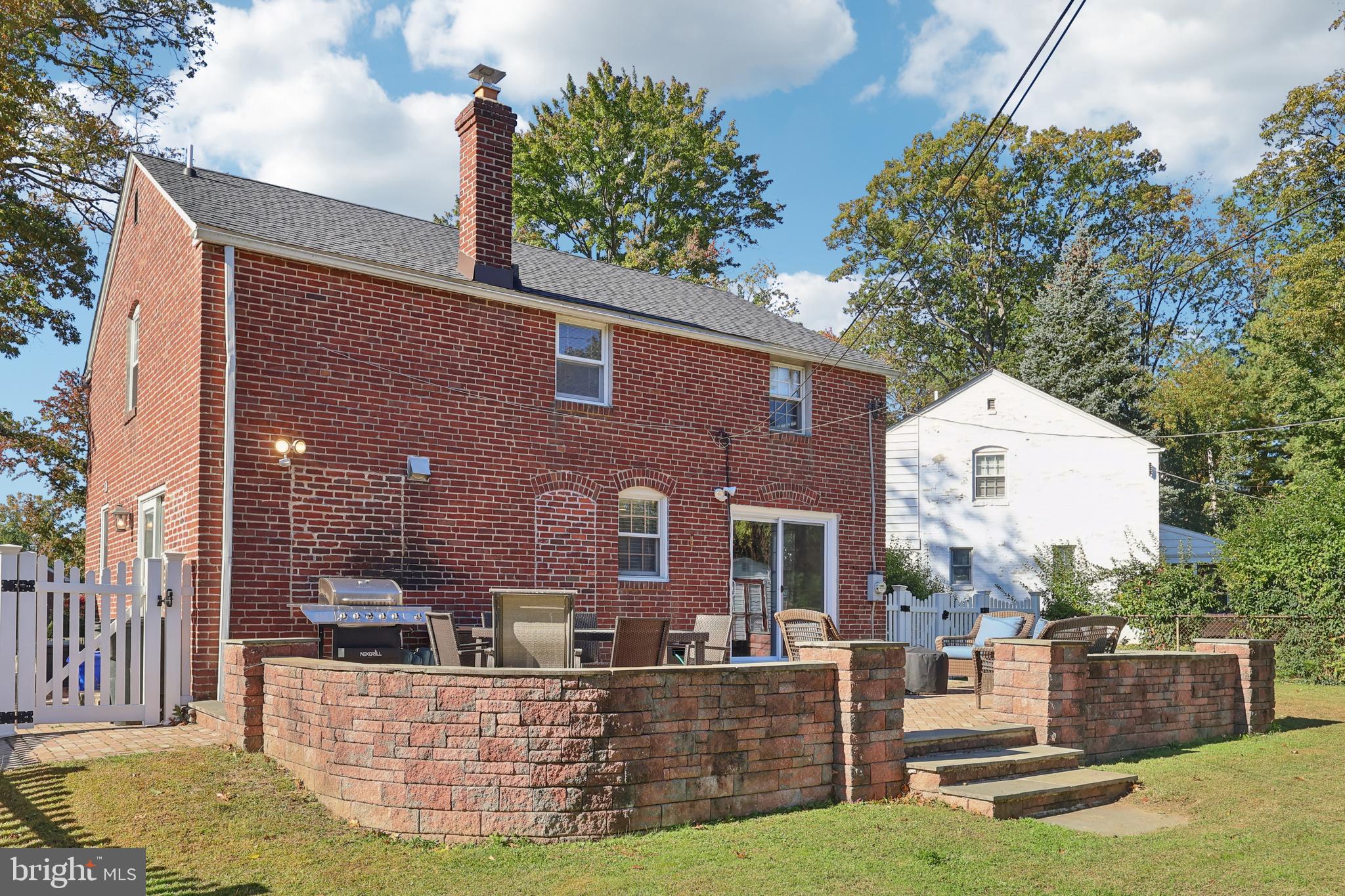 131 Fairfax Road Bryn Mawr, PA 19010 - Photo 27 of 29 a front view of a house with garden