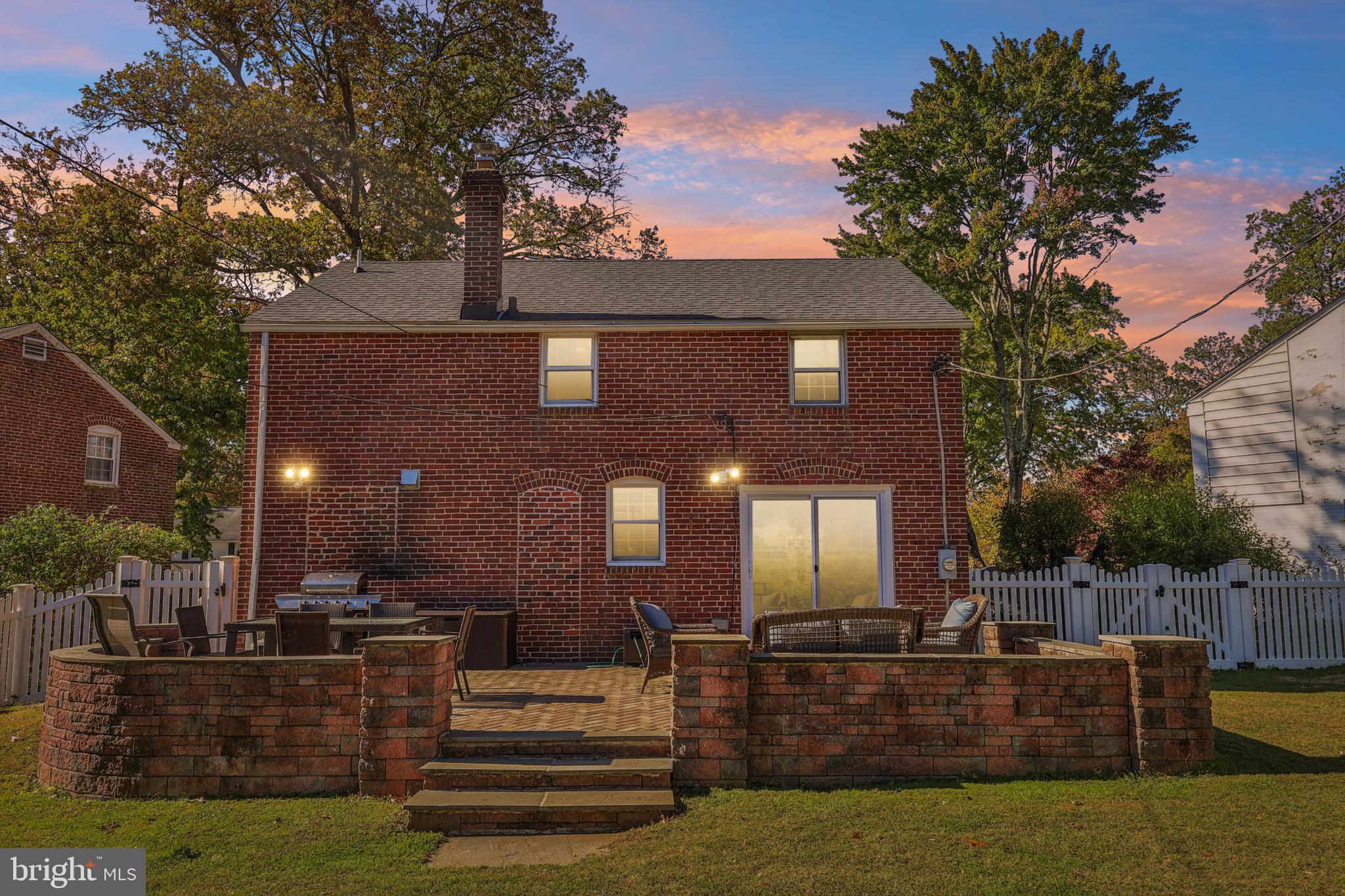 131 Fairfax Road Bryn Mawr, PA 19010 - Photo 28 of 29 a view of a building with couches table and chairs