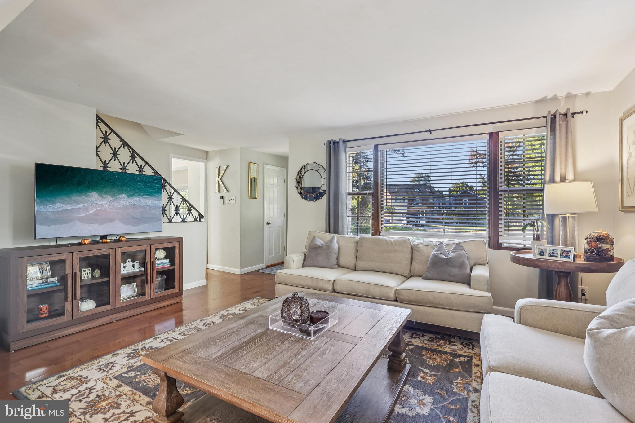 131 Fairfax Road Bryn Mawr, PA 19010 - Photo 4 of 29 a living room with furniture and a flat screen tv