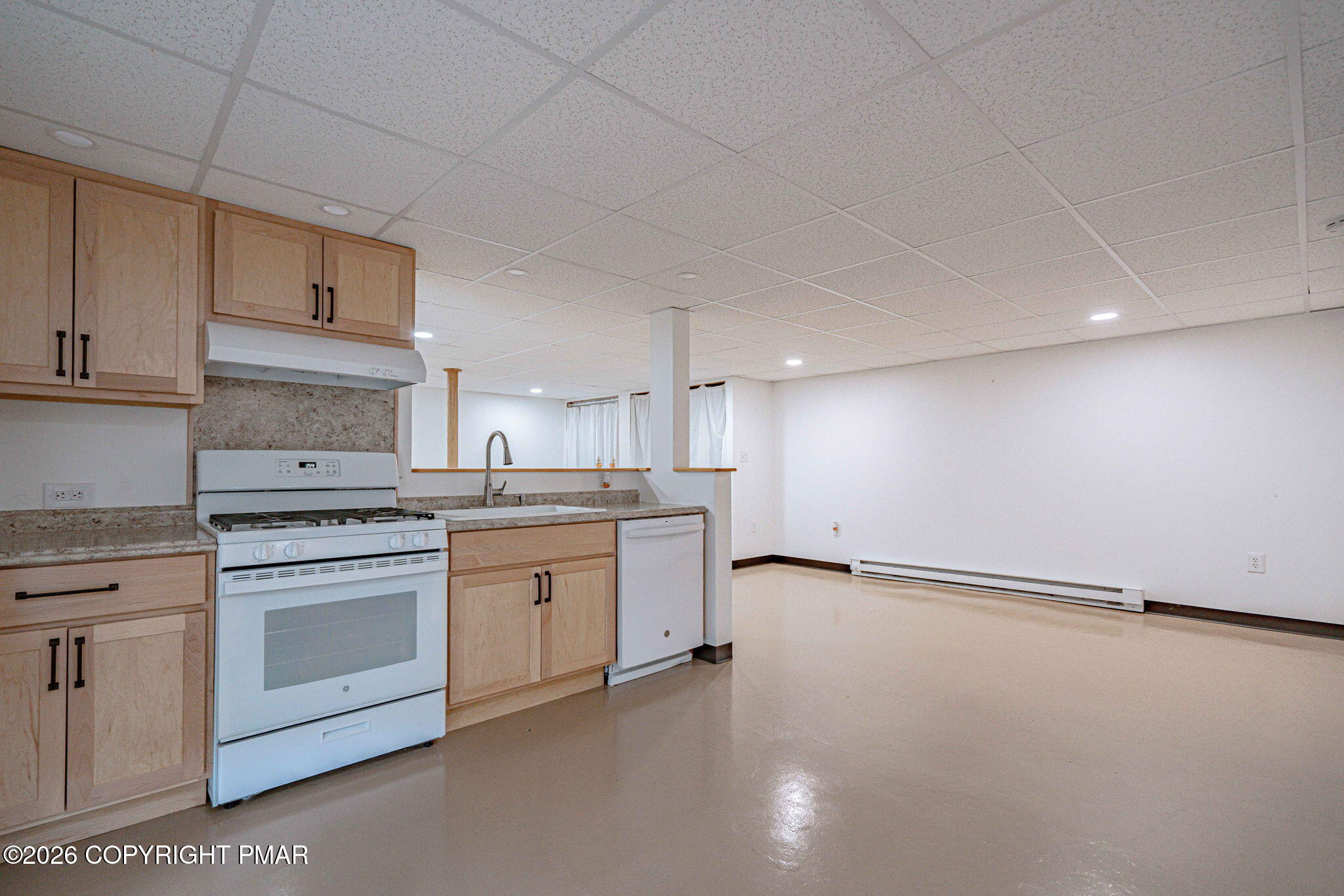 3310 Friedens Road Slatington, PA 18080 - Photo 27 of 38 a kitchen with granite countertop white cabinets and white appliances