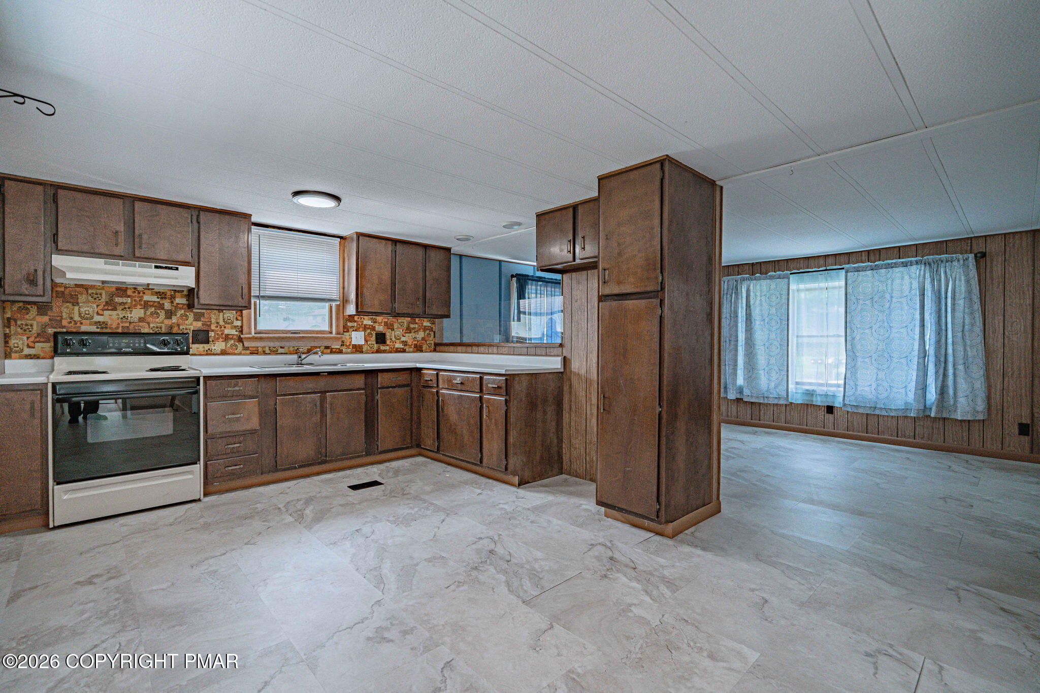 3310 Friedens Road Slatington, PA 18080 - Photo 8 of 38 a kitchen with stainless steel appliances granite countertop a stove a sink dishwasher a refrigerator and a refrigerator