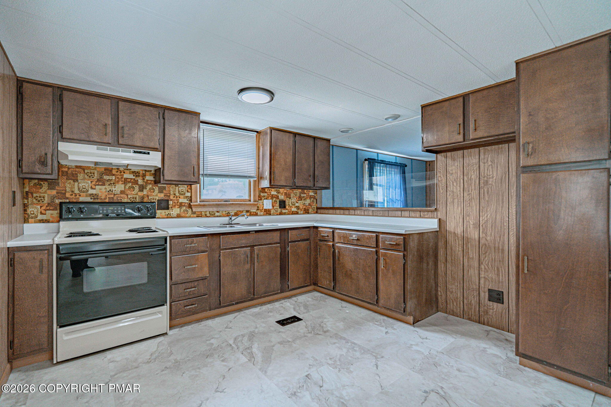 3310 Friedens Road Slatington, PA 18080 - Photo 9 of 38 a kitchen with stainless steel appliances granite countertop a refrigerator stove and sink