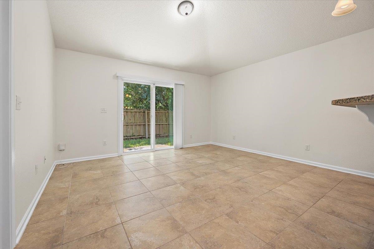161 Fallen Timber Way St. Augustine, FL 32084 - Photo 9 of 20 an empty room with windows