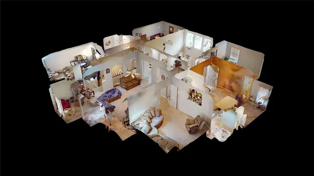 an aerial view of a house outdoor space and a kitchen