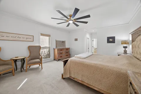 a bed room with furniture and a window