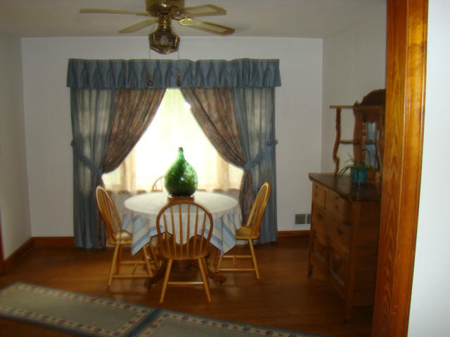 285 Blue Ridge Drive Blue Ridge, VA 24064 - Photo 3 of 46 a view of a dining room with furniture and a window