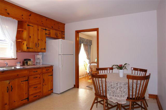 285 Blue Ridge Drive Blue Ridge, VA 24064 - Photo 23 of 46 a view of a kitchen with a table and chairs