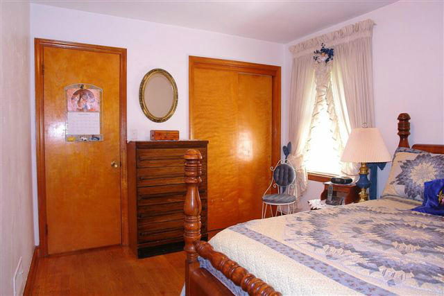 285 Blue Ridge Drive Blue Ridge, VA 24064 - Photo 29 of 46 a bedroom with a bed and a dresser