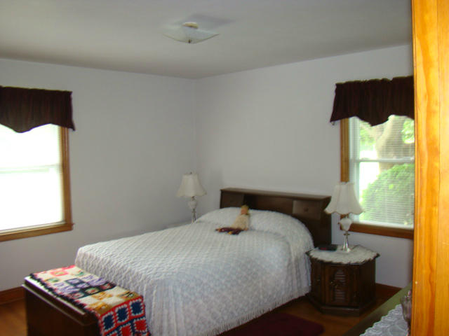 285 Blue Ridge Drive Blue Ridge, VA 24064 - Photo 4 of 46 a bedroom with a bed and a window