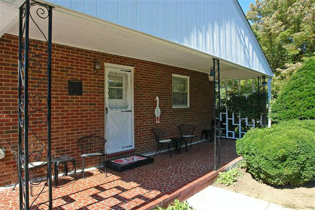 285 Blue Ridge Drive Blue Ridge, VA 24064 - Photo 44 of 46 a backyard of a house with outdoor seating