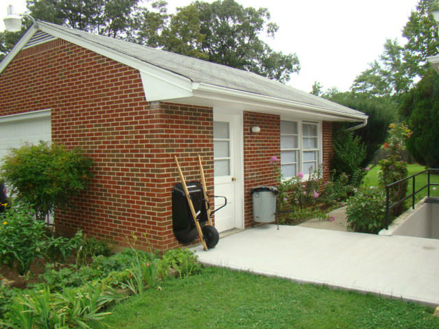 285 Blue Ridge Drive Blue Ridge, VA 24064 - Photo 10 of 46 a view of a house with a yard and a garden